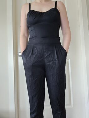 bebe Black Sleeveless Jumpsuit with Pockets